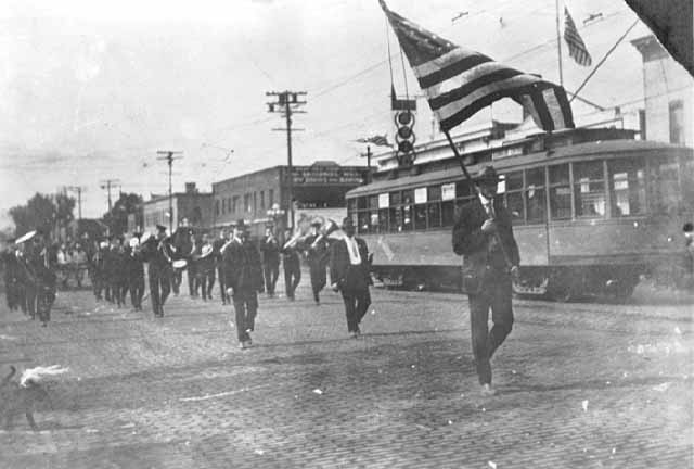 A Russian Parade on Central Avenue in 1919. You can see the former streetcar line in the background (photo courtesy of the Minnesota Historical Society)