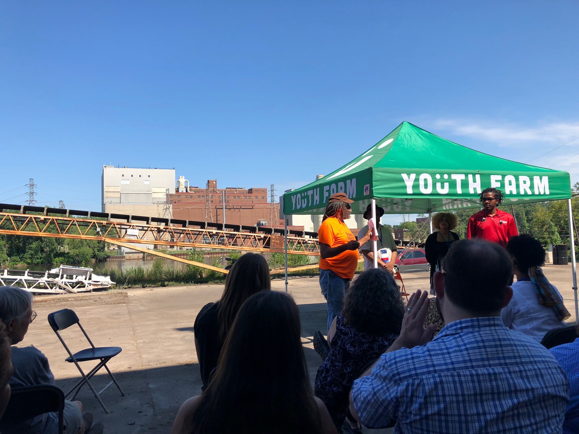 A local group talking about what they are doing in the community during a One Water Summit mobile tour