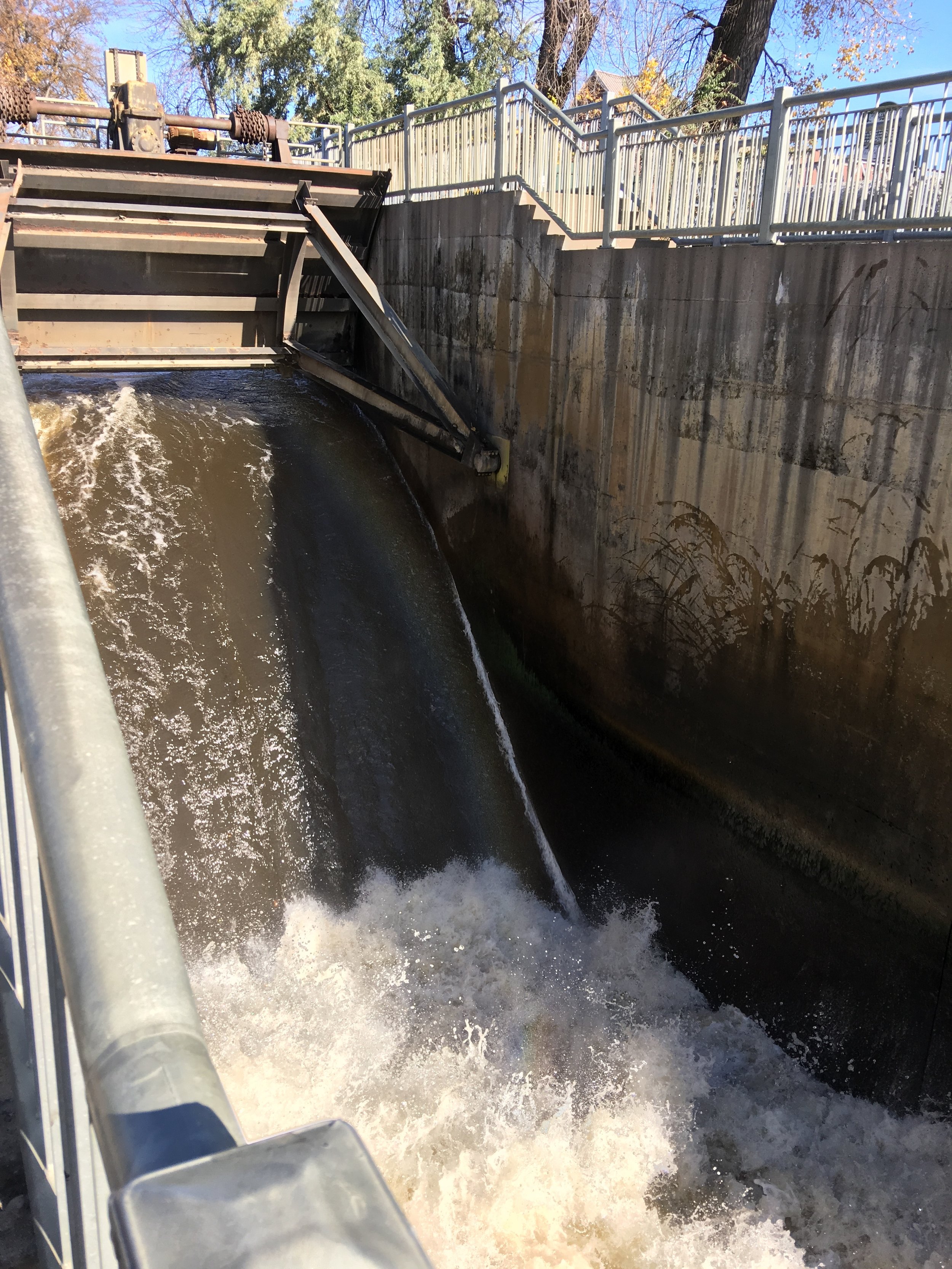 Water gushing through the open gate