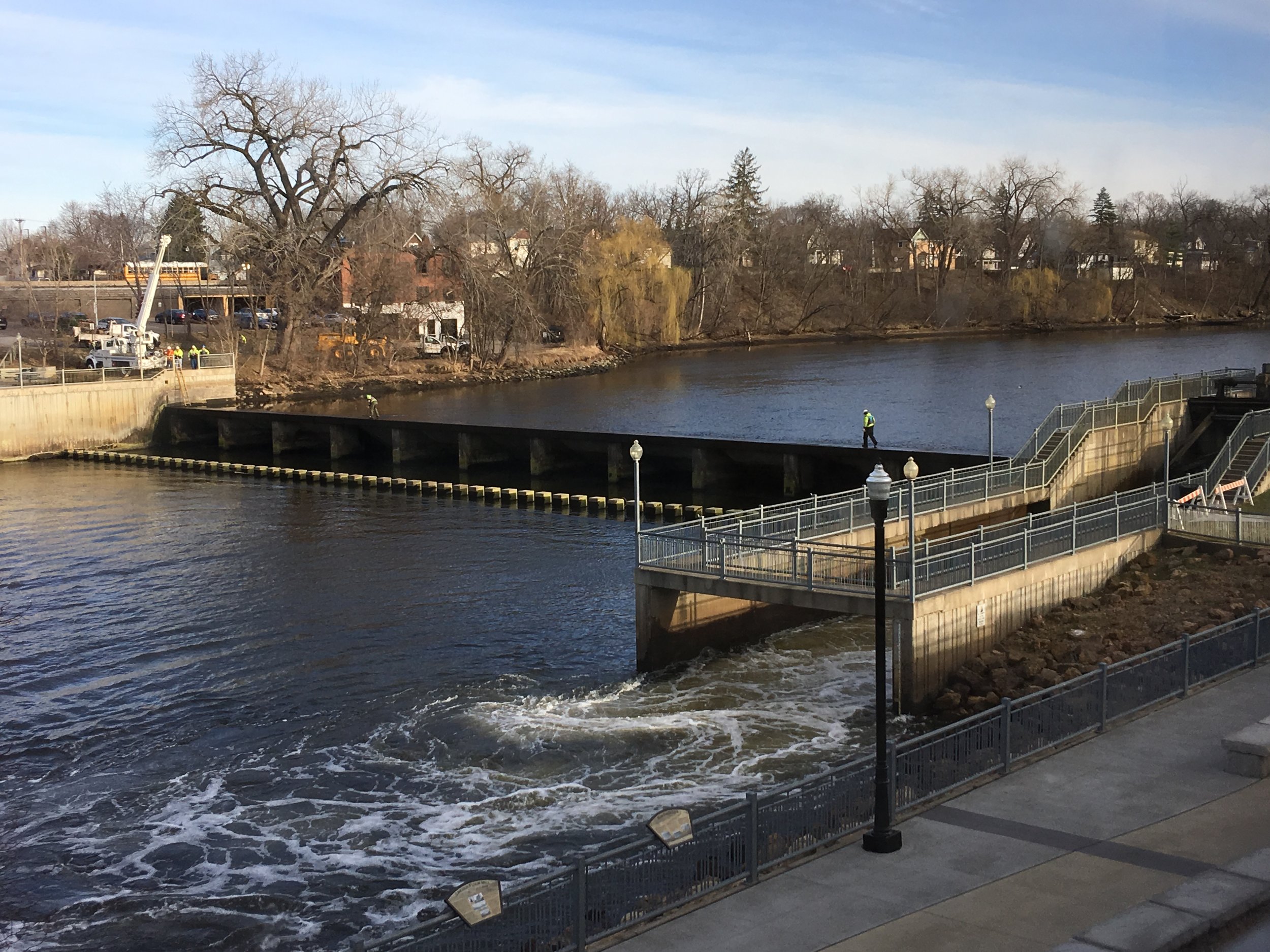 View of the dam after the gate was opened today (you can see the Public Works crew out on the platform in their yellow jackets)