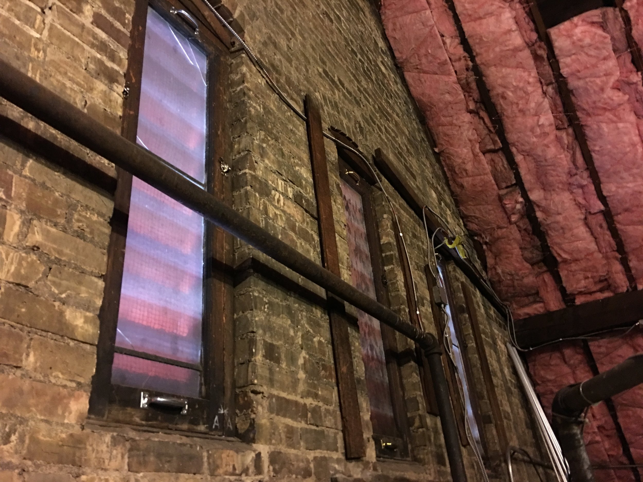 The common brick used on the interior walls viewed from the attic