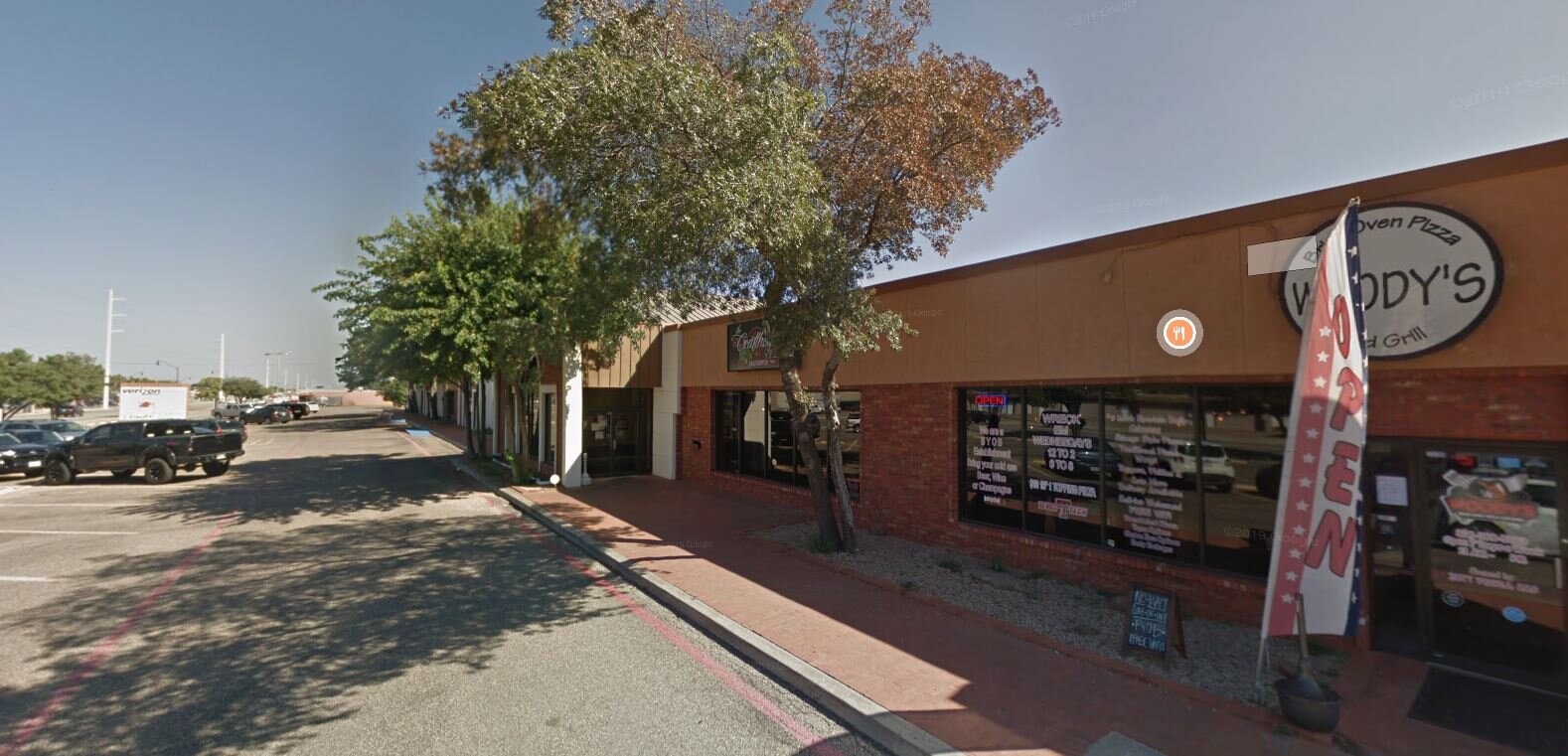 Strip commercial on 34th Street which is home to local start up businesses (image credit: maps.google.com)